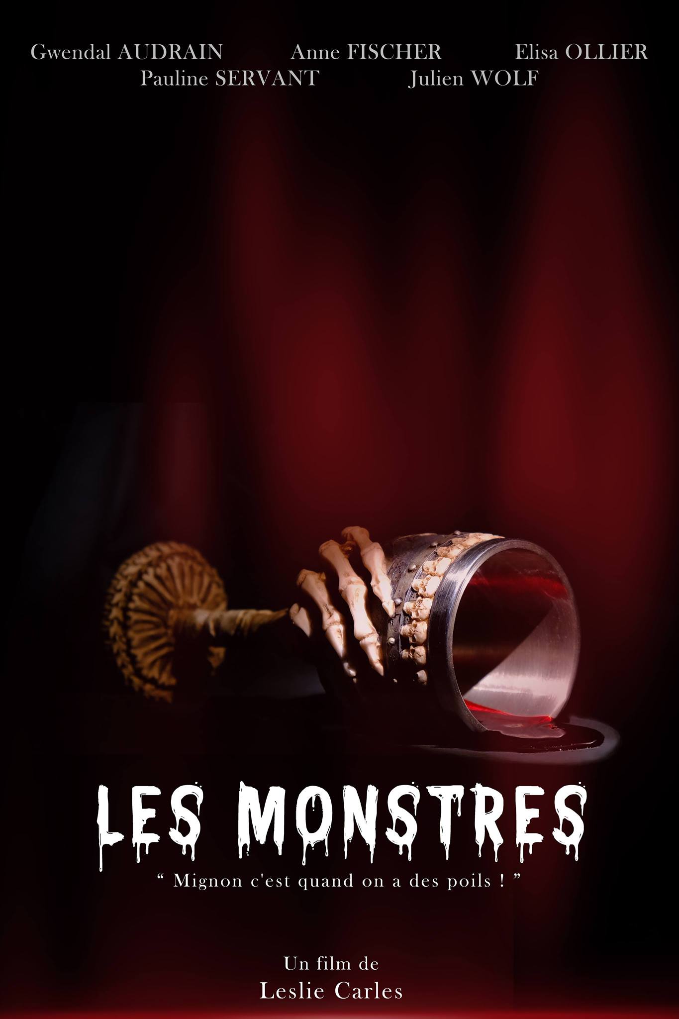 A "gothic" style upside-down cup decorated with a bone hand lets blood flow
