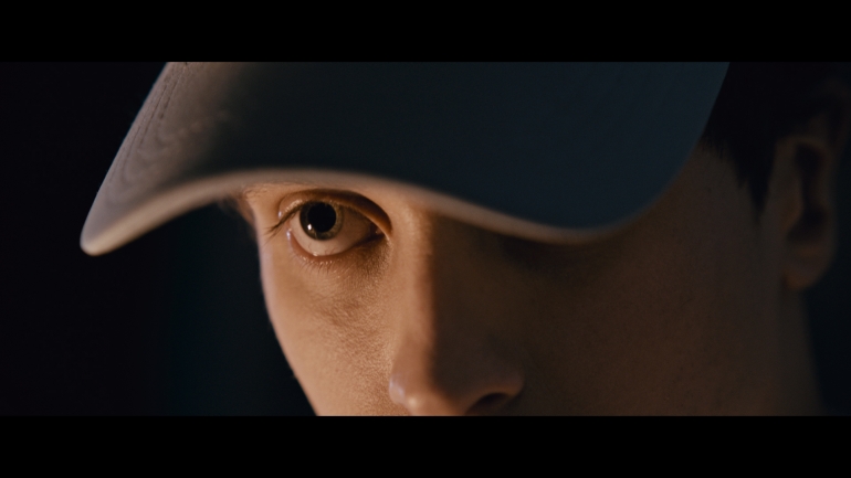 a person is gazing at something out of screen